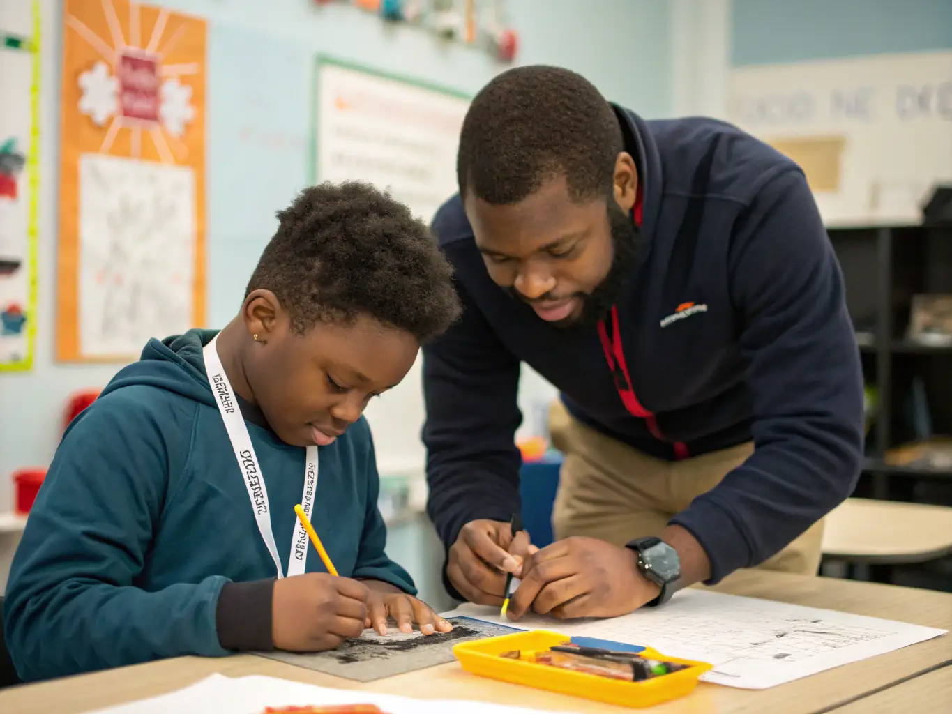 A photo of a youth mentor working with a young adult on a vocational skill, highlighting the organization's commitment to professional development and career readiness.